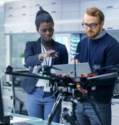 Diverse startup team working on drone, representing the Industrial Drone startup case study that uses Employee Cycle's diversity dashboard