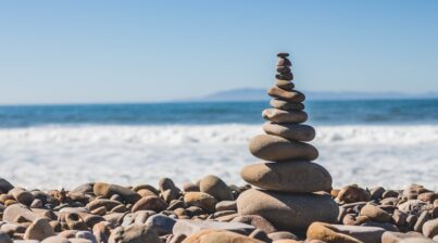 Stacked rocks on seashore