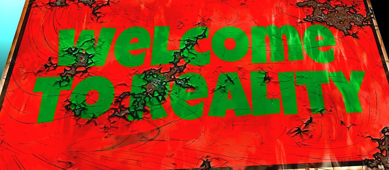Sign that says Welcome To Reality